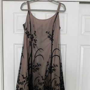 Lacy cocktail dress. Perfect midi dress for a wedding or social occasion.